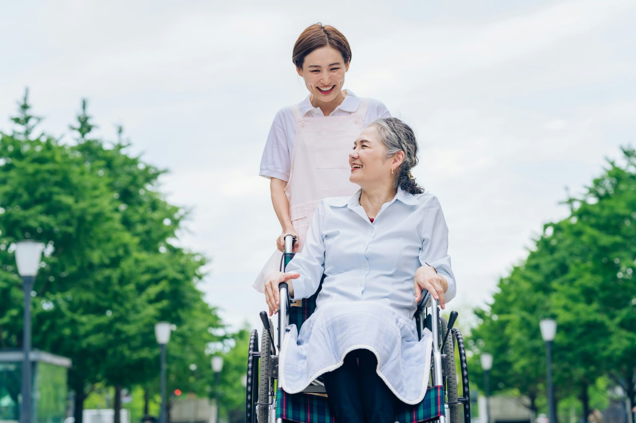 Carer with elderly client